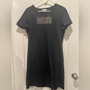 Calvin Klein black jersey dress.  Size Large Fit s more like a Medium.